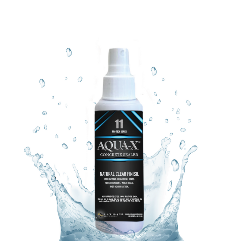White bottle of Aqua-X 11 with black label and blue graphics. Bottle is surrounded by a splash of water with droplets over a white background. Bottle states "NATURAL CLEAR FINISH" in bold letters. 