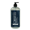 Clear 31 oz bottle with black pump dispenser lid and navy blue label saying "OBSESS moisturizing hand sanitizer unscented"
