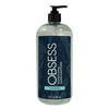 Clear 31 oz bottle with black pump dispenser lid and navy blue label saying "OBSESS moisturizing hand sanitizer fresh laundry"